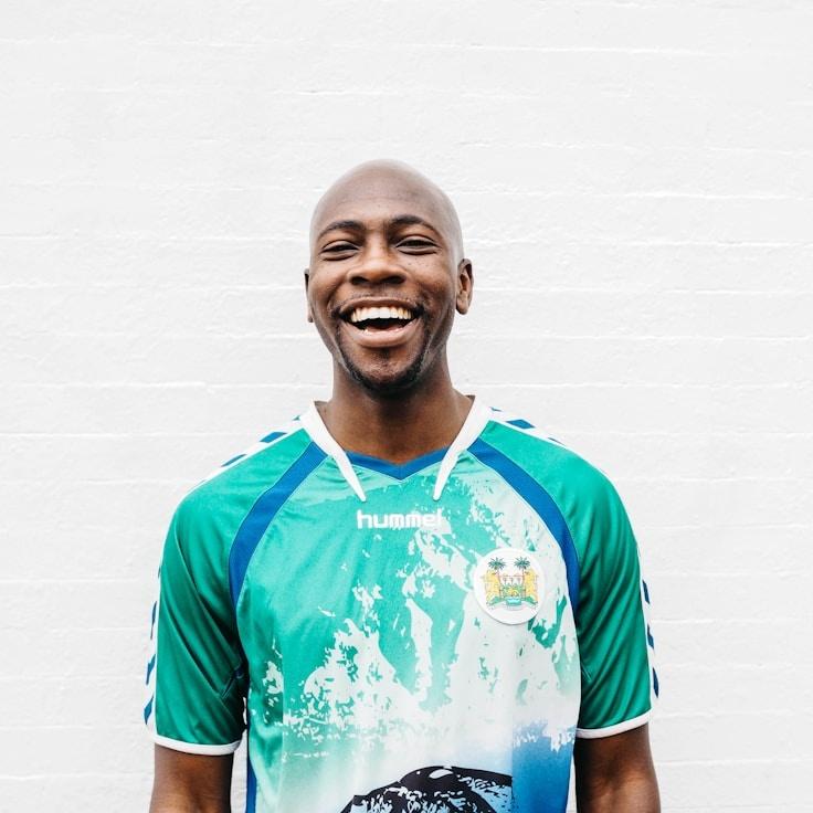 Alex Rivera, Chief Design Curator at TrueCornerMatrix, reviewing corporate floral arrangements